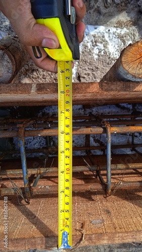 Measuring tape tool on a construction site.