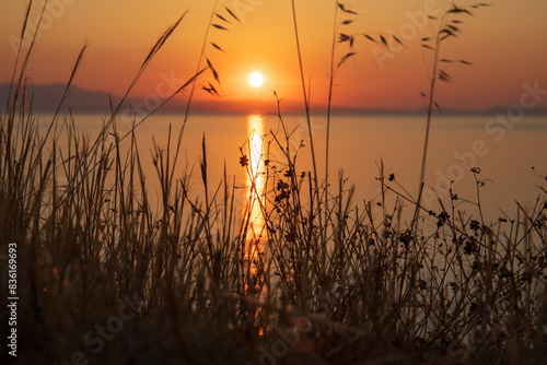 Sunrise over Tigani Beach near Tyros town  Peloponnese  Myrtoan Sea  GREECE in summer morning. Close-up.