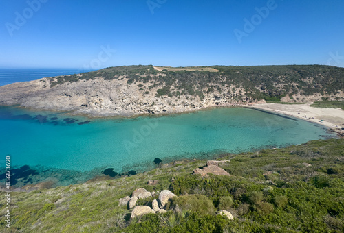 Aerial view of the crystal clear waters of Cala Lungo beach in southern Sardinia photo