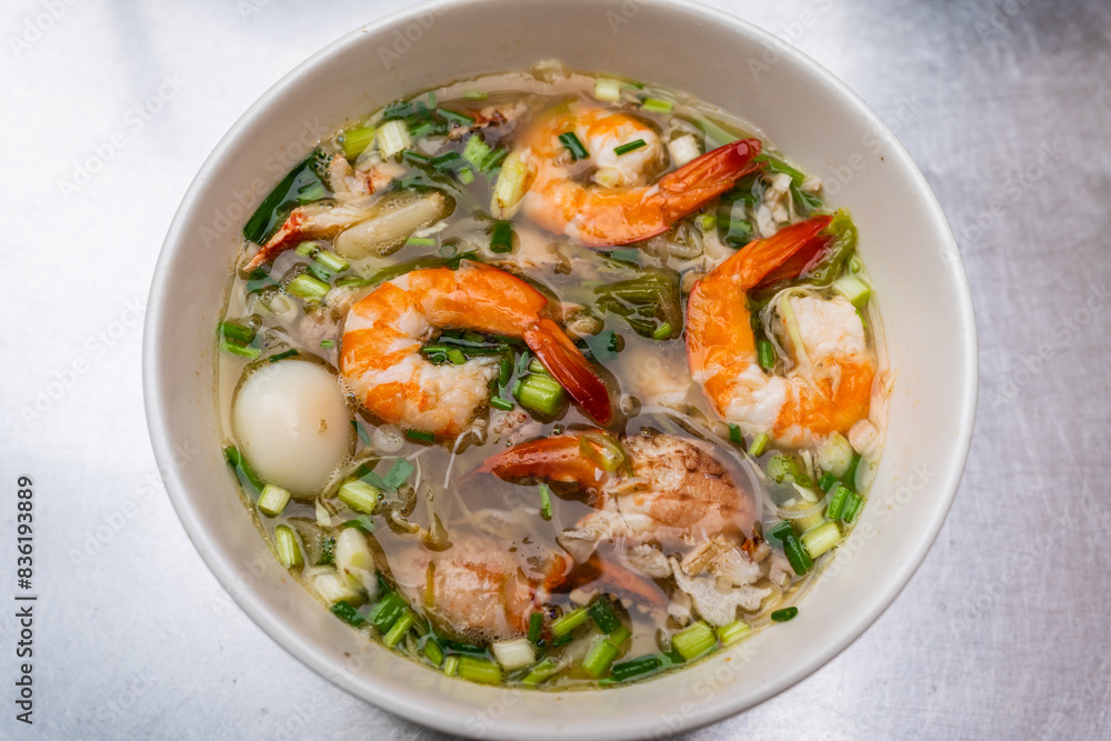 Seafood paste of rice flour (noodle) with egg, shrimp, mantis shrimp, crab and vegetables : delicious Thailand and Vietnam food Seafood paste of rice flour (noodle) with egg, shrimp, mantis shrimp, crab and vegetables : delicious Thailand and Vietnam food