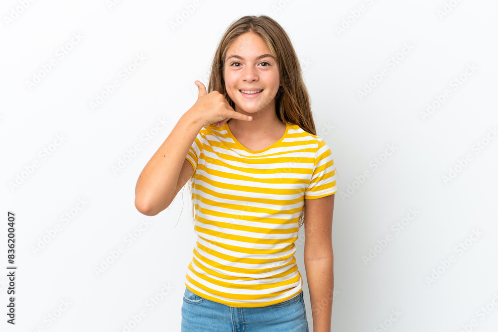 Little caucasian girl isolated on white background making phone gesture. Call me back sign Little caucasian girl isolated on white background making phone gesture. Call me back sign