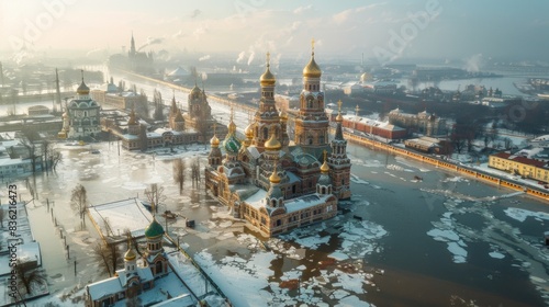 Aerial view of a flooded Nerl river sweeping around the Church of the Intercession, with golden domes glistening.