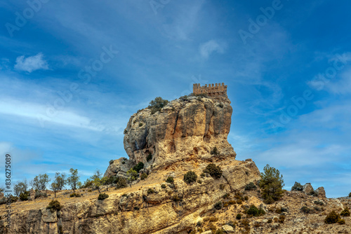 Remains of the Benizar castle on top of a hill in the Sierra de Moratalla, Region of Murcia, Spain, in a beautiful natural environment
