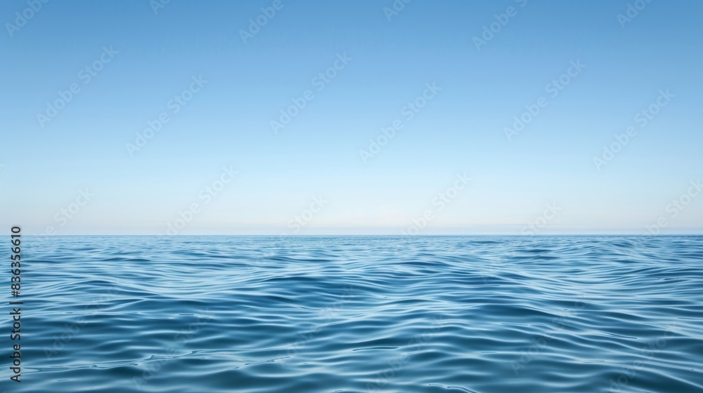 Tranquil Seascape with Clear Blue Sky and Copyspace for Text, Serene View of Calm Ocean Waves - Perfect for Relaxation and Travel Concepts Tranquil Seascape with Clear Blue Sky and Copyspace for Text, Serene View of Calm Ocean Waves - Perfect for Relaxation and Travel Concepts