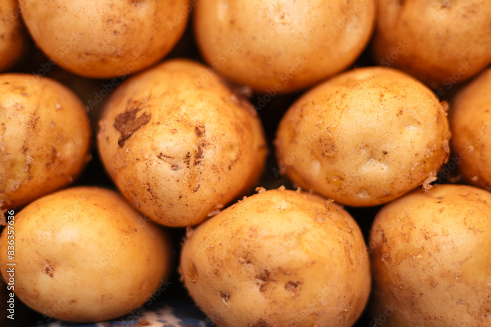 Young fresh potatoes on a bazaar counter Young fresh potatoes on a bazaar counter