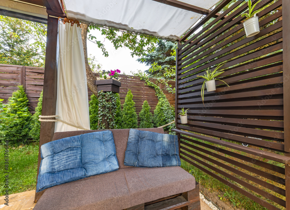 Garden terrace, resting place, flowers, wooden pergola Garden terrace, resting place, flowers, wooden pergola