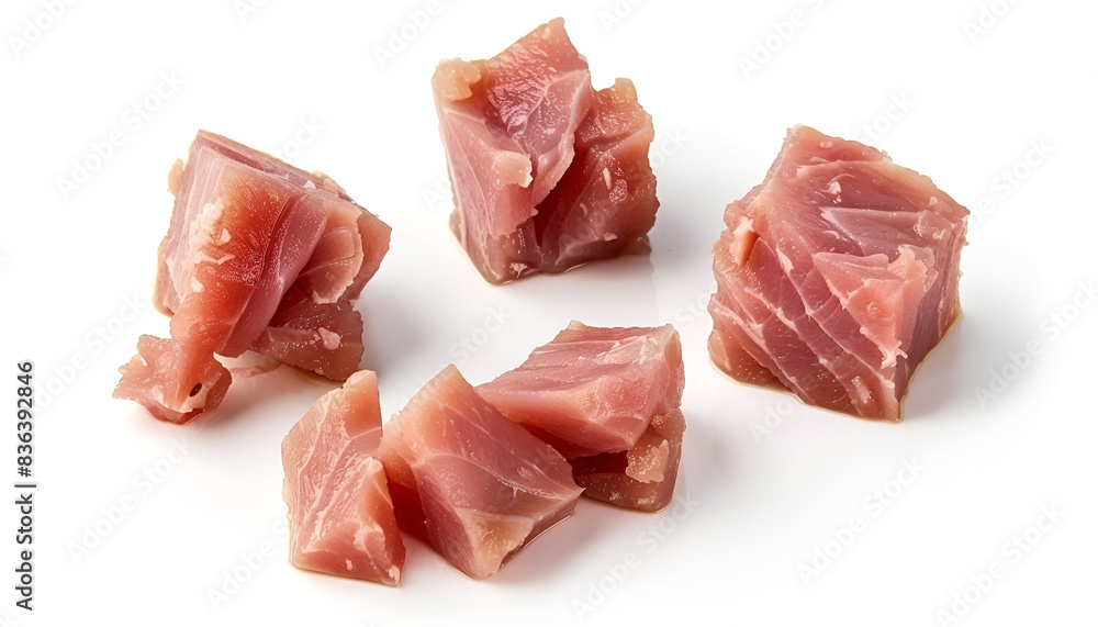 Collage with pieces of canned tuna on white background Collage with pieces of canned tuna on white background