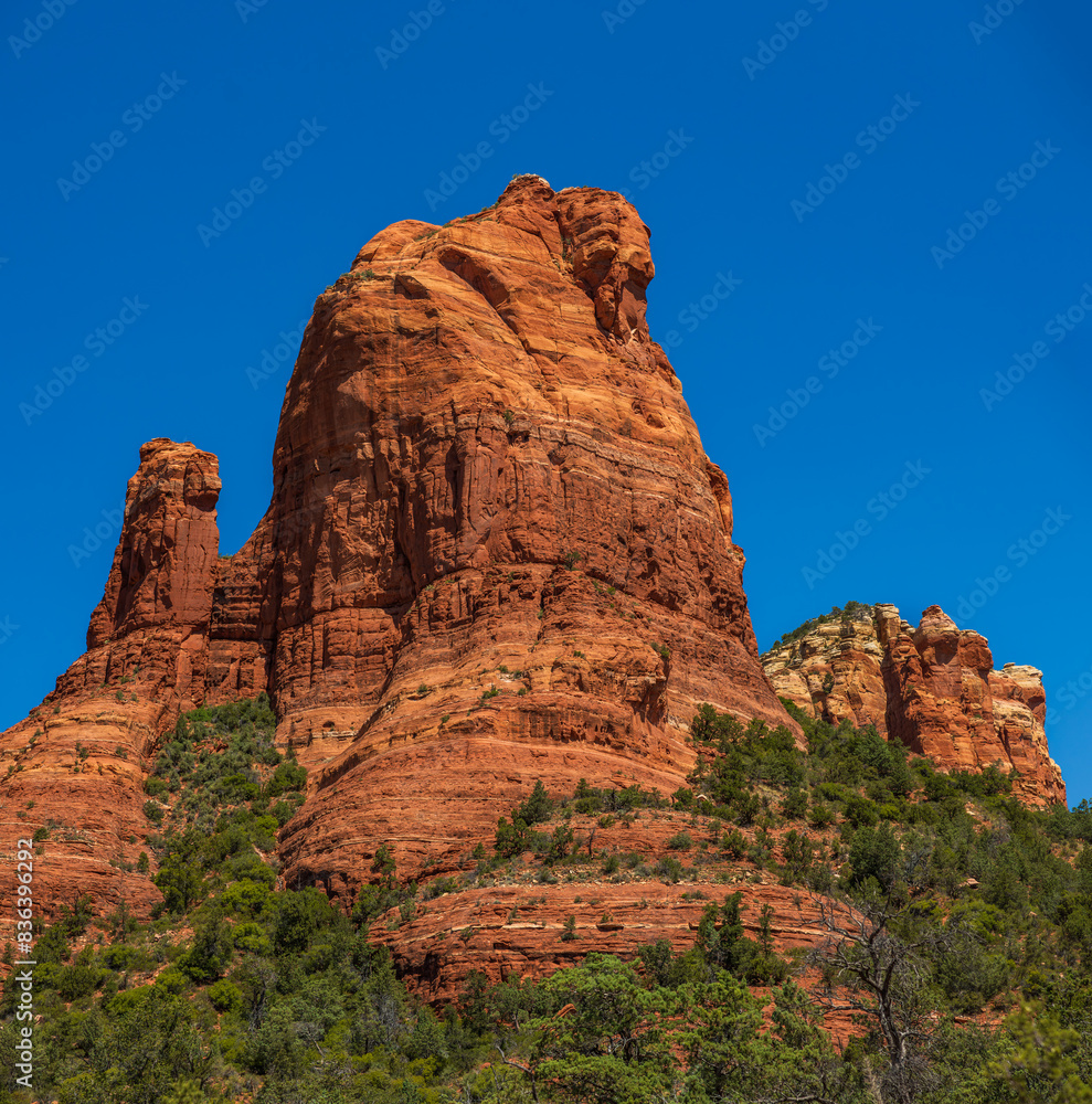 Desert cliff geologic formation with deep blue sky