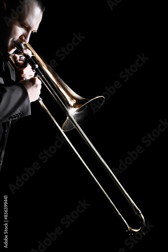 Trombone player. Trombonist playing jazz music brass instrument