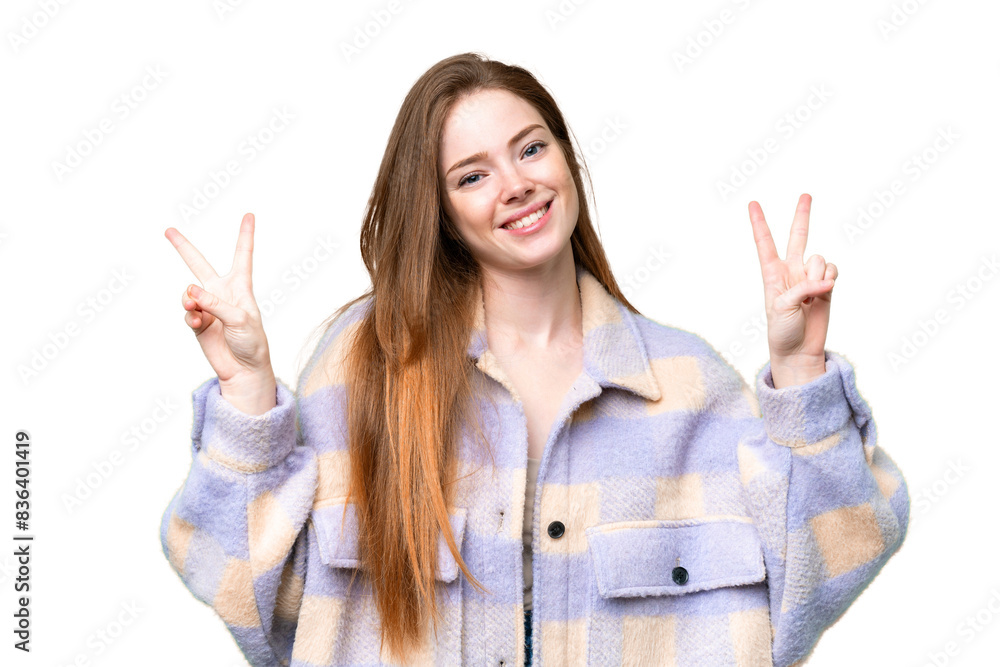 Young pretty woman over isolated chroma key background showing victory sign with both hands Young pretty woman over isolated chroma key background showing victory sign with both hands