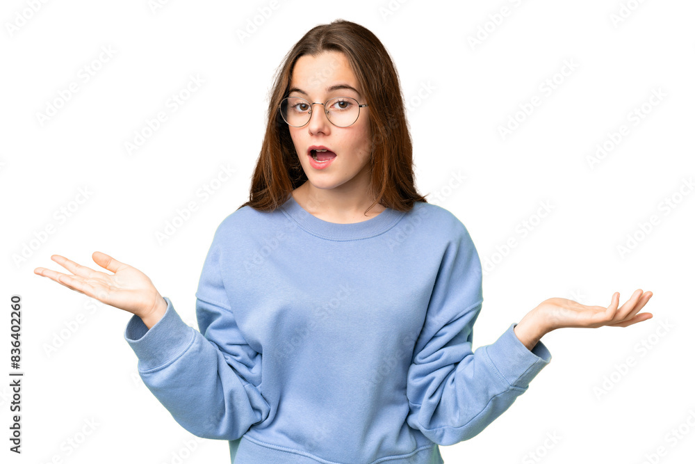 Teenager girl over isolated chroma key background with shocked facial expression Teenager girl over isolated chroma key background with shocked facial expression