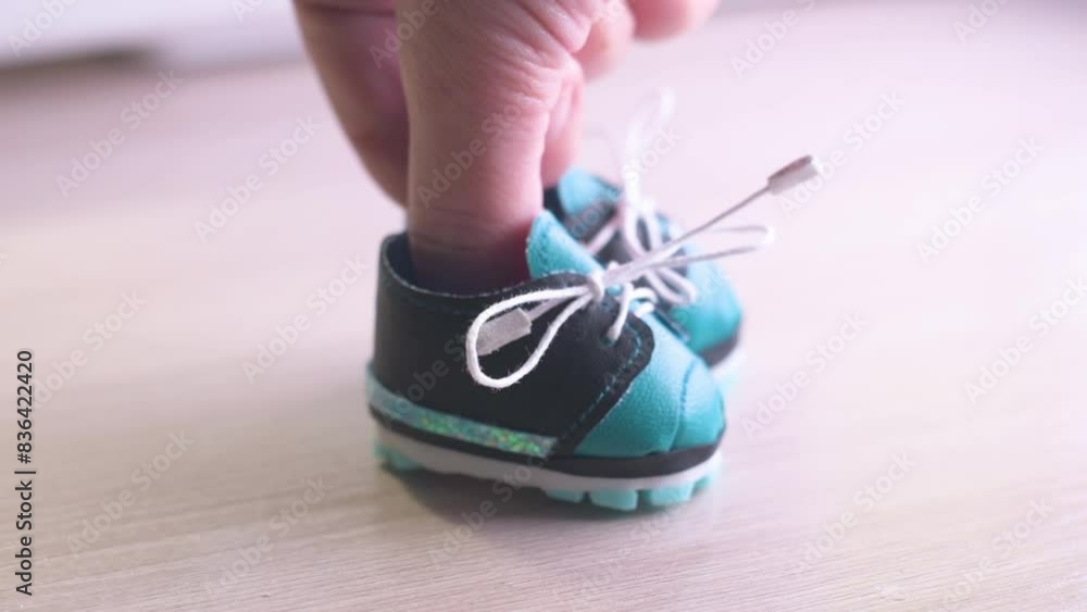 close-up demonstration of doll shoes close-up demonstration of doll shoes