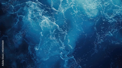 Fototapeta Naklejka Na Ścianę i Meble -  A close-up shot of a wave breaking on the surface of the ocean