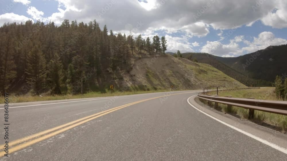 Driving plate on curvy mountain highway Driving plate on curvy mountain highway