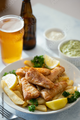 Photography fish and chips with ale beer, tartar and mushy peas