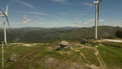 Aerial video above Casa do Penedo Boulder House in Fafe, Portugal
