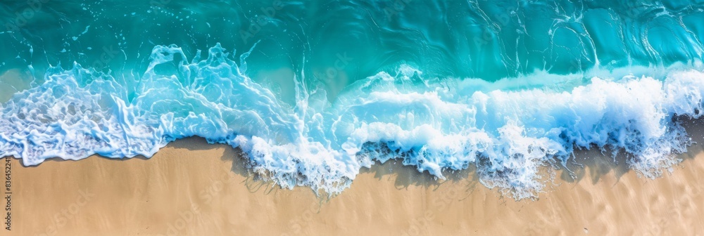 Sandy beach and soft blue ocean wave top view. Summer background Sandy beach and soft blue ocean wave top view. Summer background
