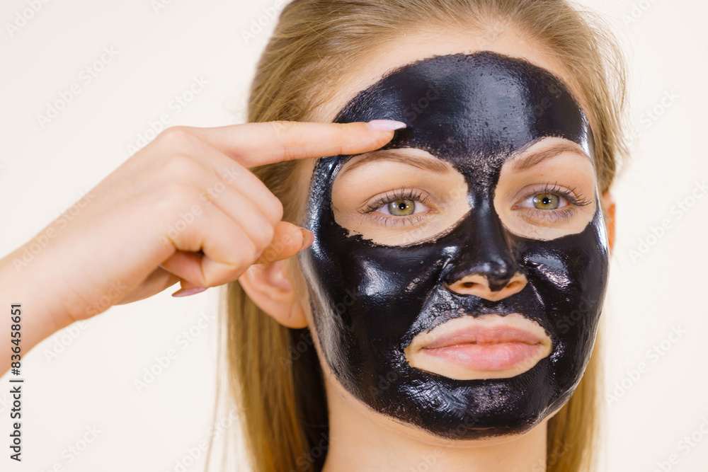 © anetlanda - Girl black carbo peel off mask on face © anetlanda - Girl black carbo peel off mask on face