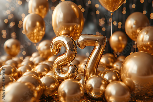 Number 27 made in golden metallic balloons, birthday celebration
