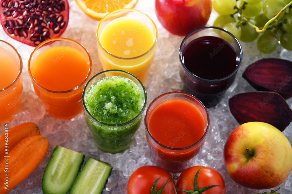 Glasses with fresh organic vegetable and fruit juices Glasses with fresh organic vegetable and fruit juices