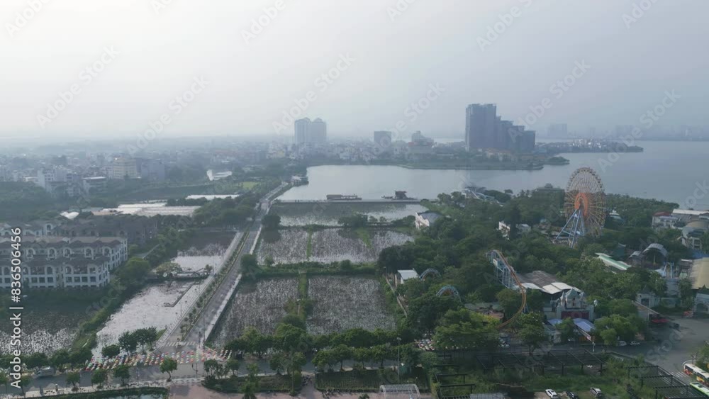 Aerial view of residential neighborhood roofs. Urban housing development from above. Top view. Real estate in Hanoi City, Vietnam. Property real estate. Aerial view of residential neighborhood roofs. Urban housing development from above. Top view. Real estate in Hanoi City, Vietnam. Property real estate.