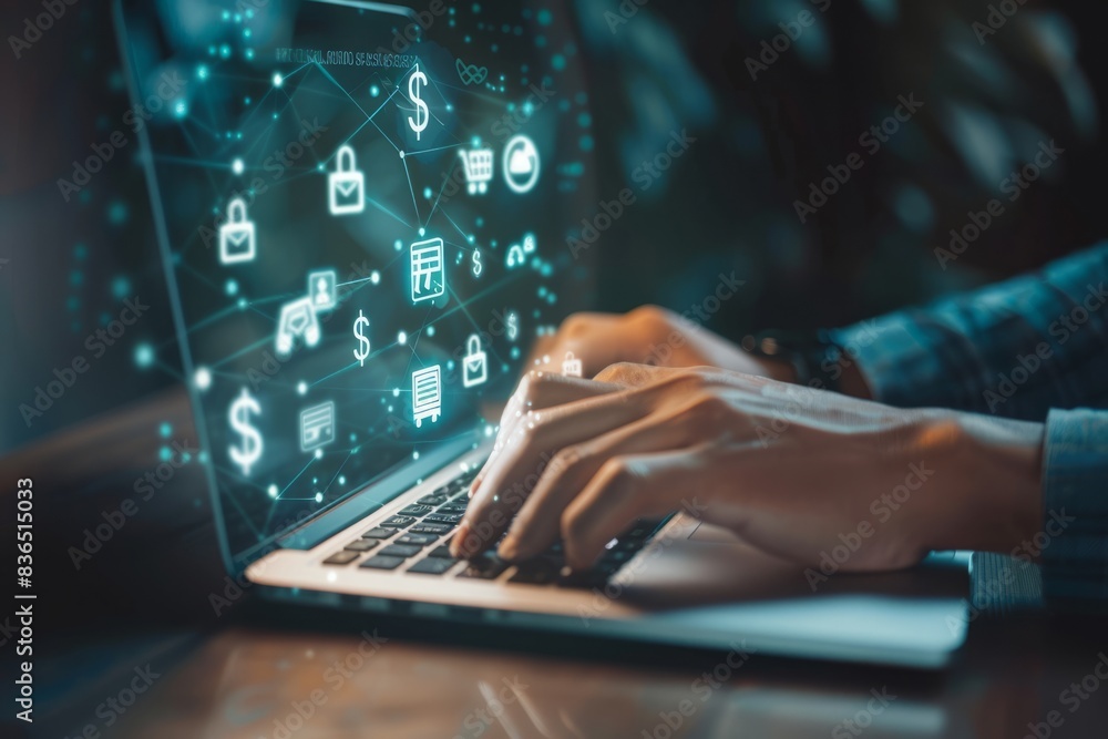 The businessman's hand uses a laptop, pointing to a virtual screen of money bag ICONS, charts or financial development charts, budgets and financial planning concepts. The businessman's hand uses a laptop, pointing to a virtual screen of money bag ICONS, charts or financial development charts, budgets and financial planning concepts.