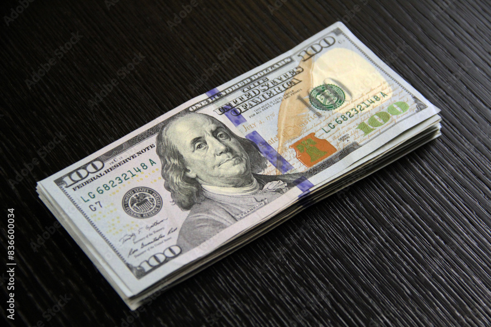 100 Dollar Bills USA Bank Notes Stacked Pile Ben Franklins Shadow 100 Dollar Bills USA Bank Notes Stacked Pile Ben Franklins Shadow