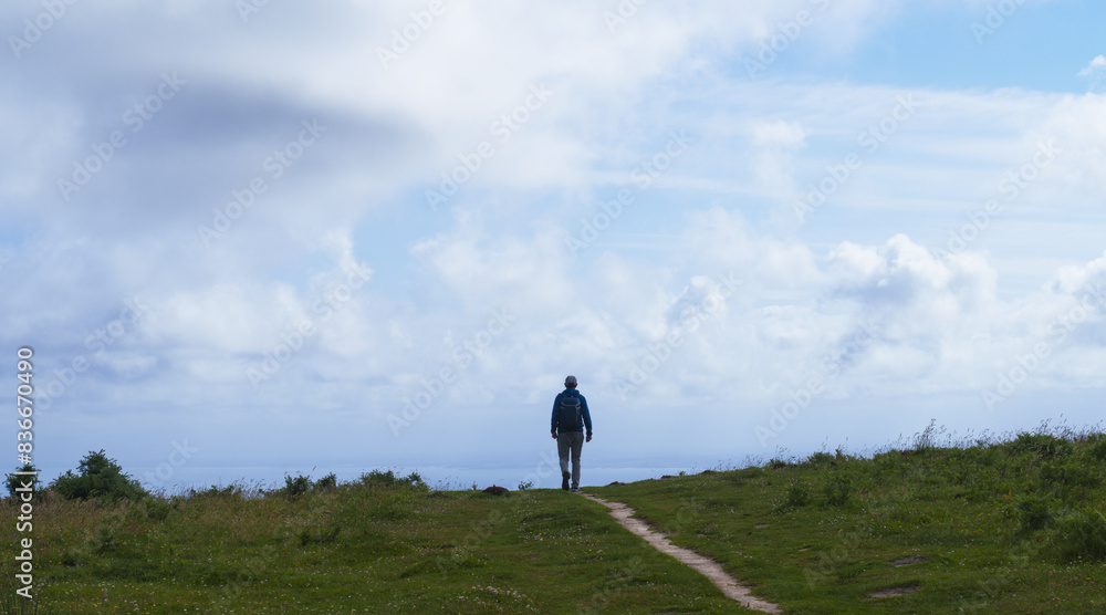 Hiker in Jaizkibel. Hiker in Jaizkibel mountain, Euskadi. Hiker in Jaizkibel. Hiker in Jaizkibel mountain, Euskadi.