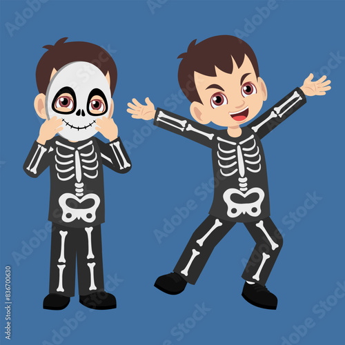 Happy cute little kid boy in skeleton costume celebrating festival Halloween excited