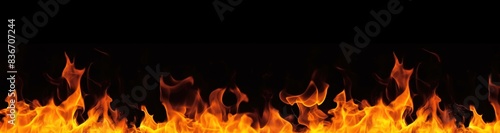  The burning flames are isolated on a black background 