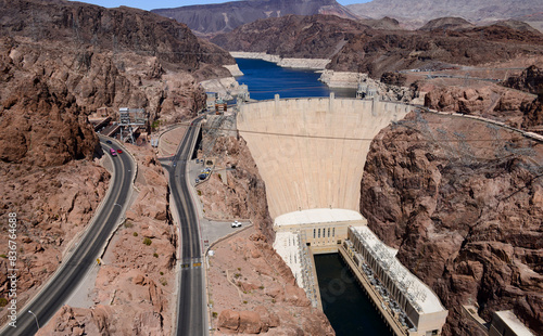 Hoover Dam is a concrete arch-gravity dam in the Black Canyon of the Colorado River, on the border between the U.S. states of Nevada and Arizona.