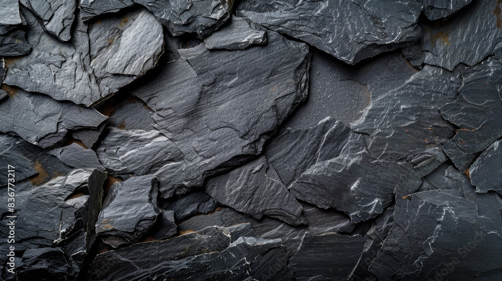 Rich textures of black or dark gray rough grainy stone background for design needs. Rich textures of black or dark gray rough grainy stone background for design needs.