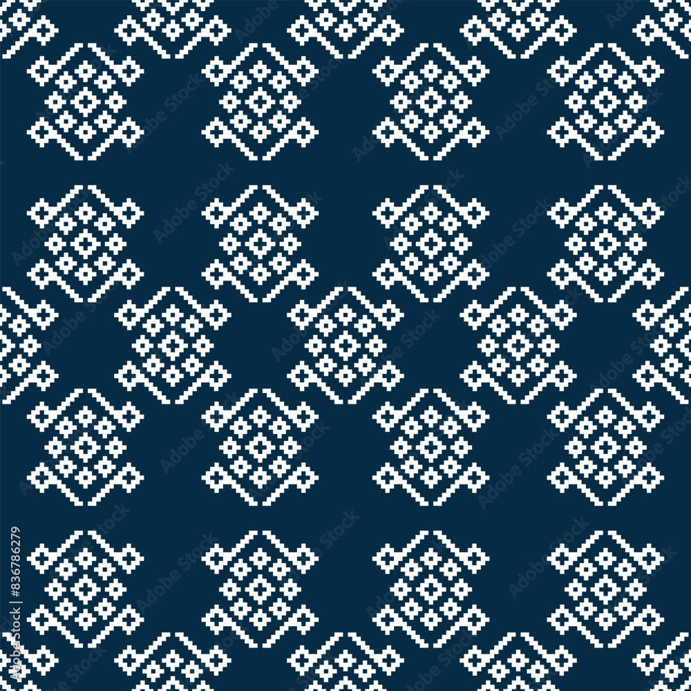 Traditional ethnic motifs ikat geometric fabric pattern cross stitch.Ikat embroidery Ethnic oriental Pixel blue background. Abstract,vector,illustration. Texture,decoration,wallpaper. Traditional ethnic motifs ikat geometric fabric pattern cross stitch.Ikat embroidery Ethnic oriental Pixel blue background. Abstract,vector,illustration. Texture,decoration,wallpaper.