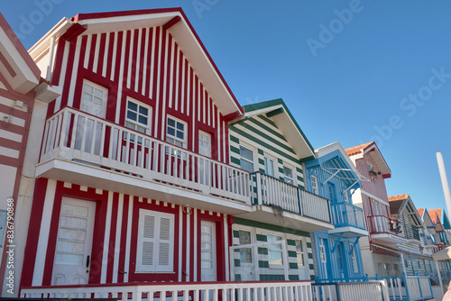 Facades of colorful fisheman houses in Costa Nova, Aveiro, Portugal photo