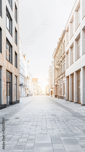 Empty street with modern architecture and natural sun lighting. Urban scenes. © JuanM