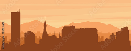 Brown panoramic poster of the city skyline with misty background buildings, sunrise, clouds and mountains of CALI, COLOMBIA
