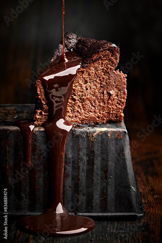 Chocolate Basque cheesecake slice with chocolate sauce