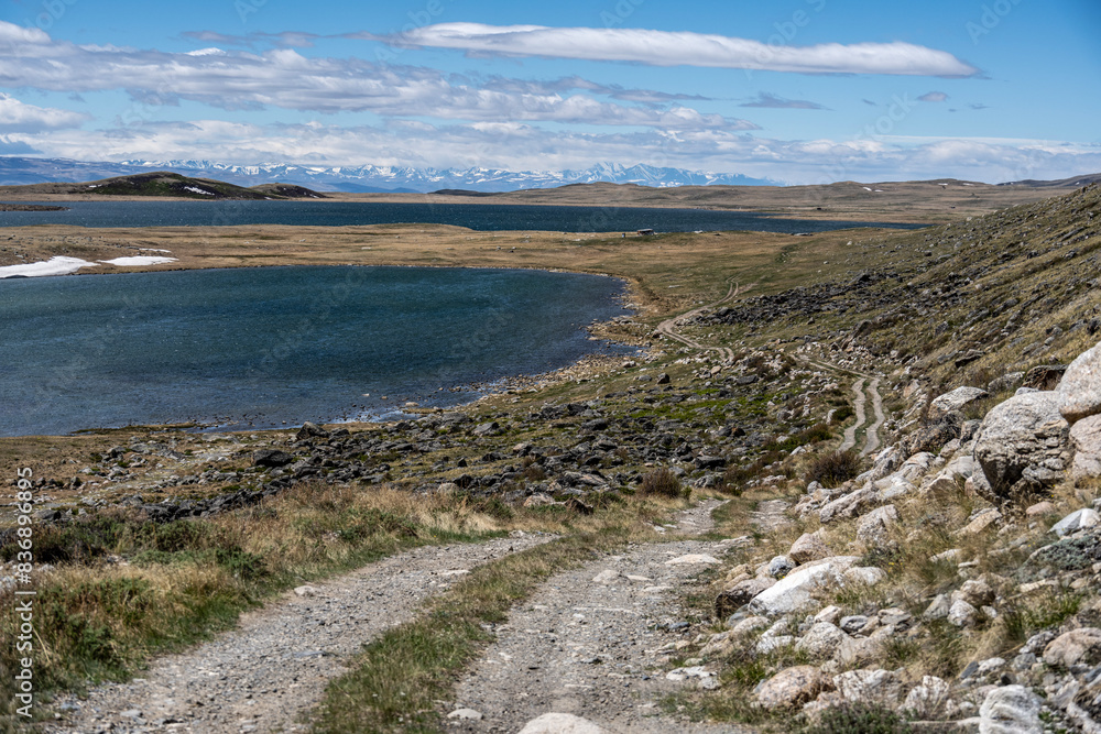 andscape of the surroundings of the village of Kosh Agach mountains with lakes and unusual landscapes in the southern regions of Altai in May andscape of the surroundings of the village of Kosh Agach mountains with lakes and unusual landscapes in the southern regions of Altai in May