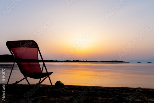 Beautiful nature with sunrise on the beach and sea or ocean. Nature composition.