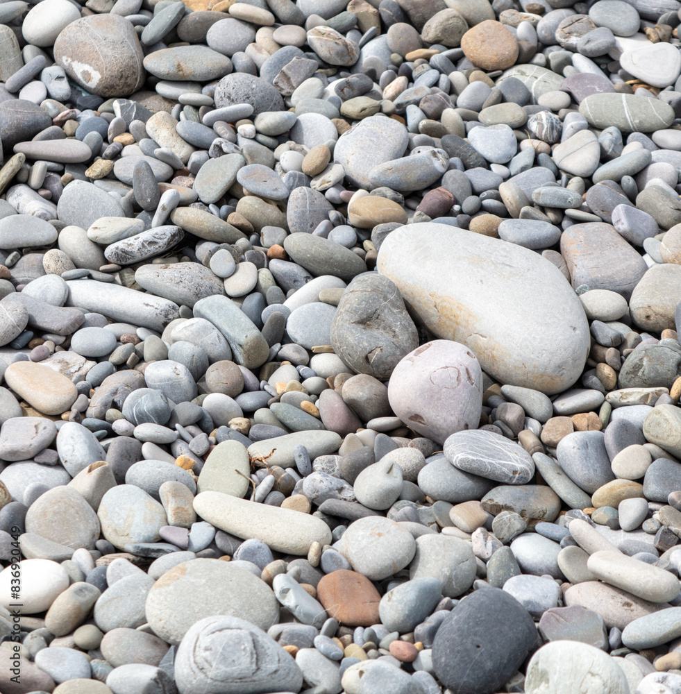 Pebbles on the seashore as an abstract background. Texture Pebbles on the seashore as an abstract background. Texture