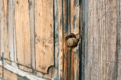 Wallpaper Mural Old wooden door with modern door lock cylinder Torontodigital.ca