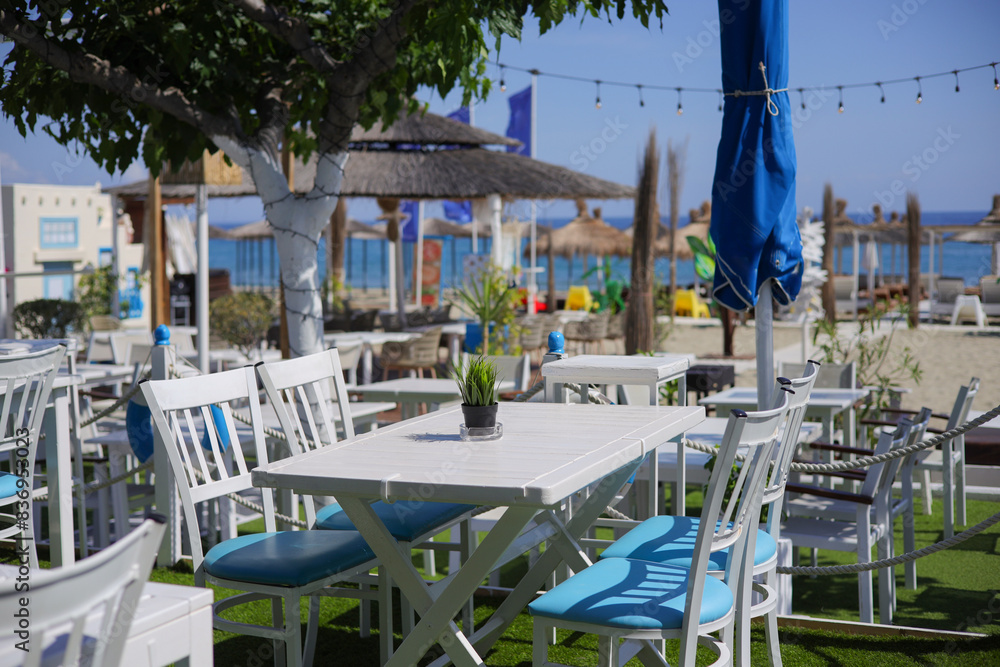 A blue and white beach bar on the Mediterranean Sea at the Olympic Riviera in Greece A blue and white beach bar on the Mediterranean Sea at the Olympic Riviera in Greece