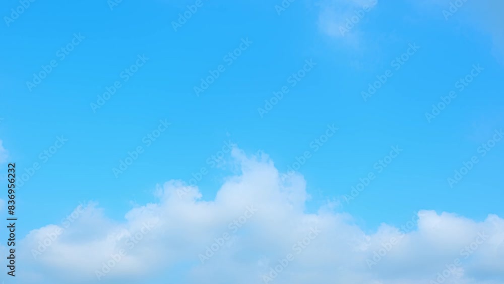 The majestic movement of clouds, from cumulus to cirrus, across a brilliantly blue sky in this detailed 4K time-lapse. Cloud formations concept. 4K video clips. Timelapse. Blue sky background.
The majestic movement of clouds, from cumulus to cirrus, across a brilliantly blue sky in this detailed 4K time-lapse. Cloud formations concept. 4K video clips. Timelapse. Blue sky background.