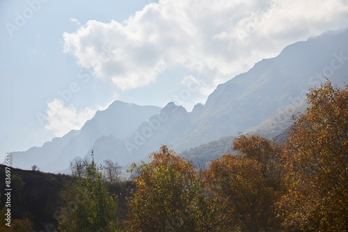 Beautiful natural landscape. The autumn season. Mountains covered with forest.