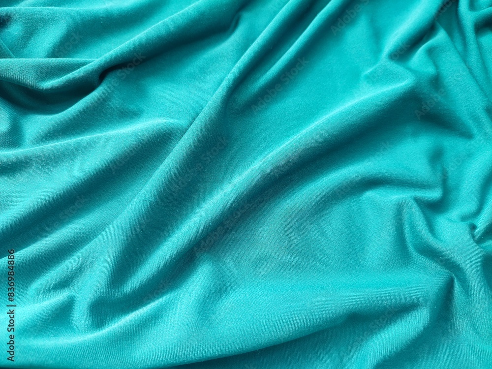 Cyan colored fabric texture and background Cyan colored fabric texture and background