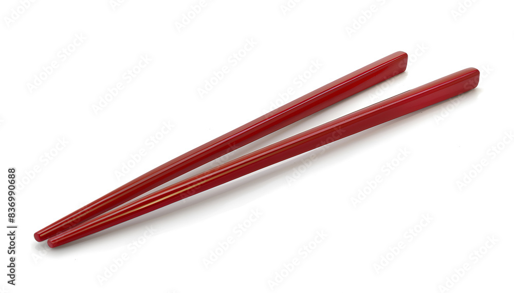 Pair of red chopsticks isolated on white Pair of red chopsticks isolated on white