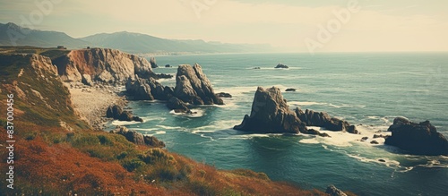Sea with rocks Colorful landscape Beautiful wild nature Soft vintage effect. Creative banner. Copyspace image photo