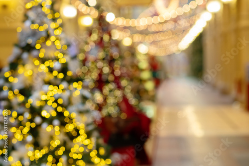 Christmas tree blurred background  merry garland  bright lights  winter celebration