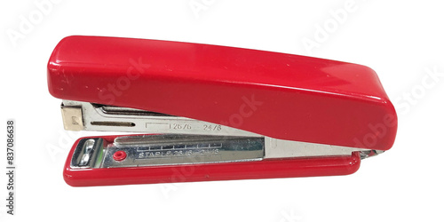 Red stapler on isolated background