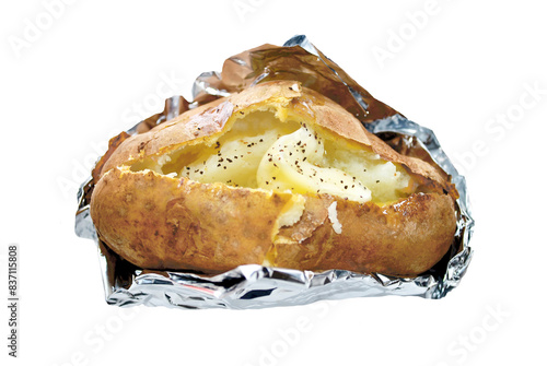 Baked potato with butter, wrapped in foil.